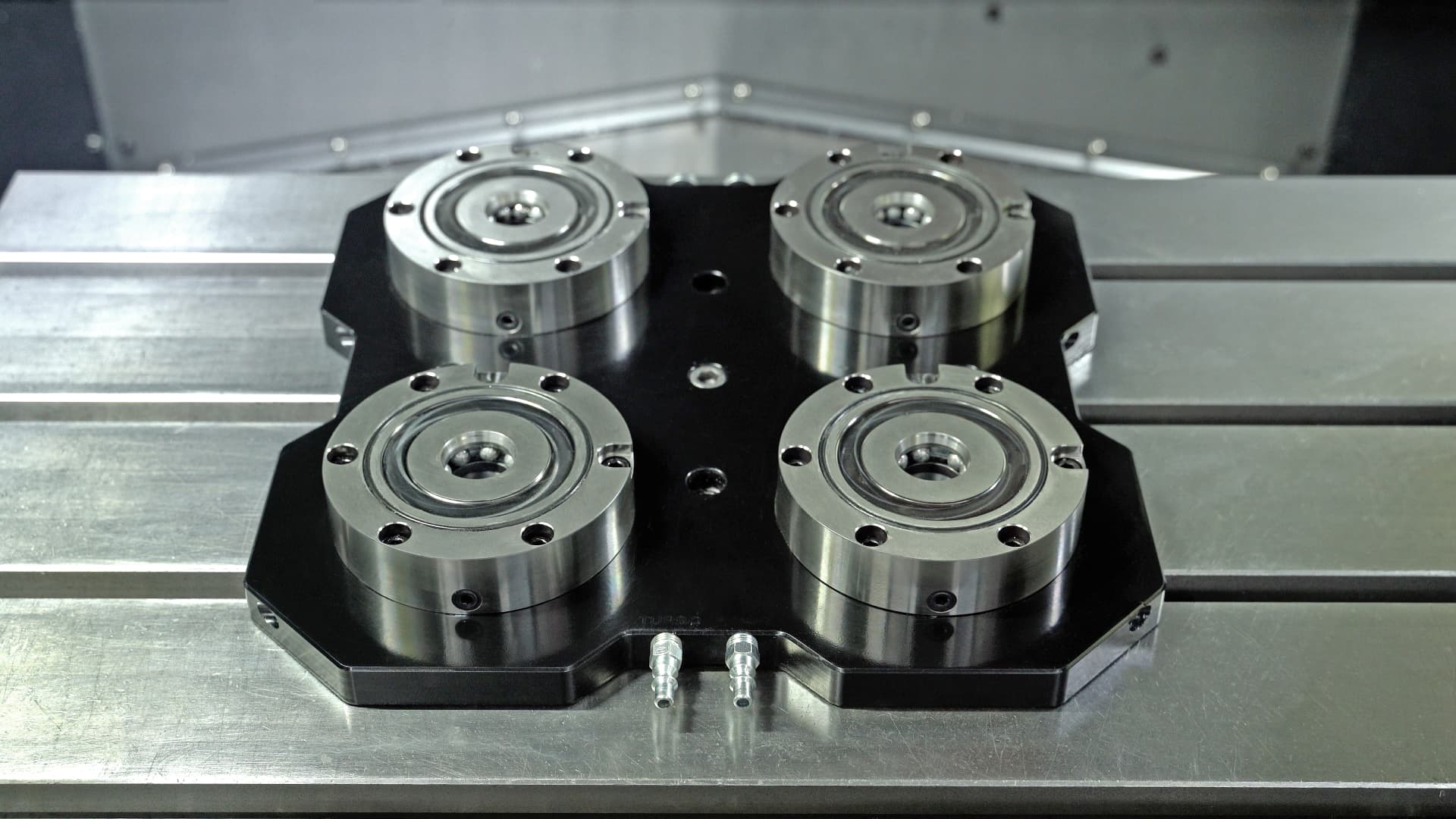 Base com quatro pontos de fixação